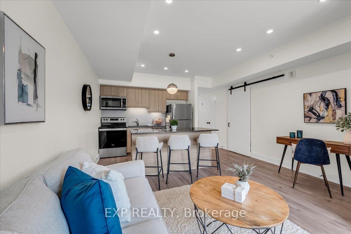 Photo 4 of Unit 410, 8 Culinary Lane, Barrie, Innis-Shore — HOMEH