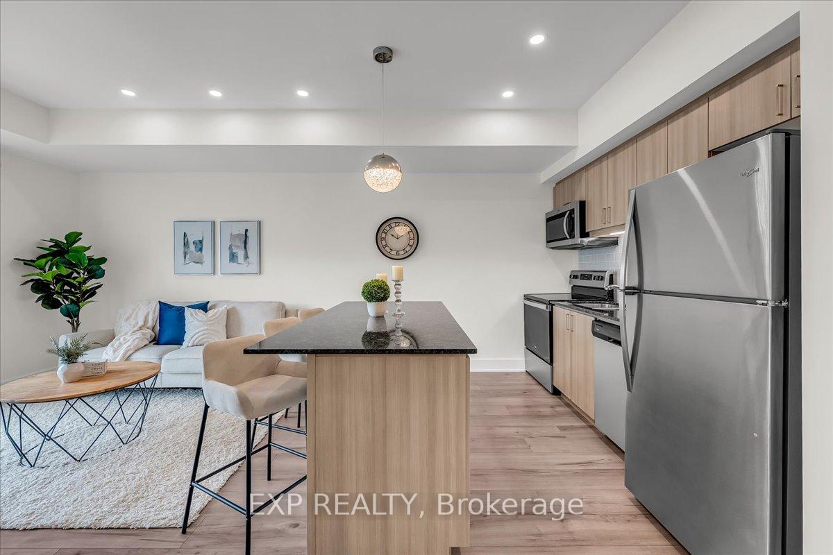 Photo 6 of Unit 410, 8 Culinary Lane, Barrie, Innis-Shore — HOMEH