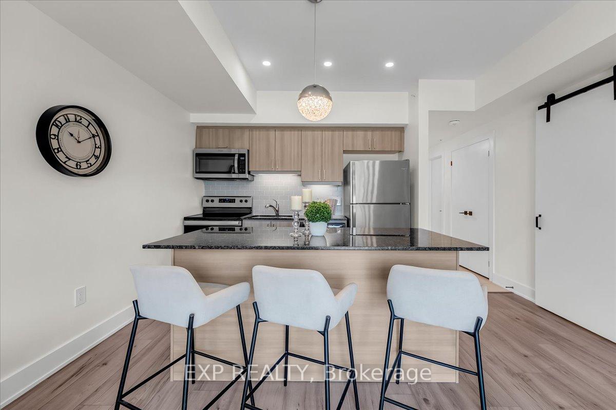 Photo 8 of Unit 410, 8 Culinary Lane, Barrie, Innis-Shore — HOMEH