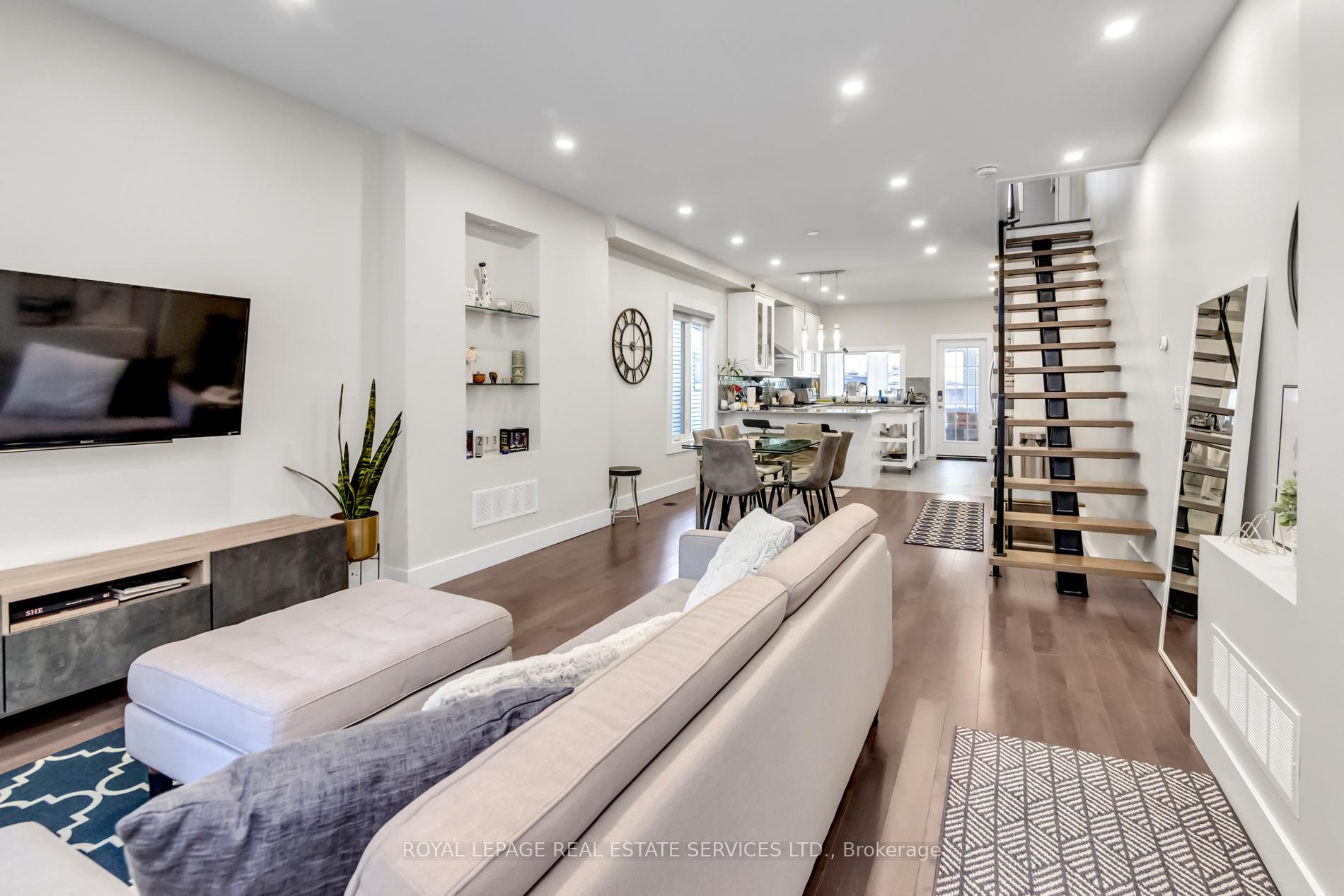 Photo 2 of 129 Langford Avenue, Toronto, Danforth — HOMEH