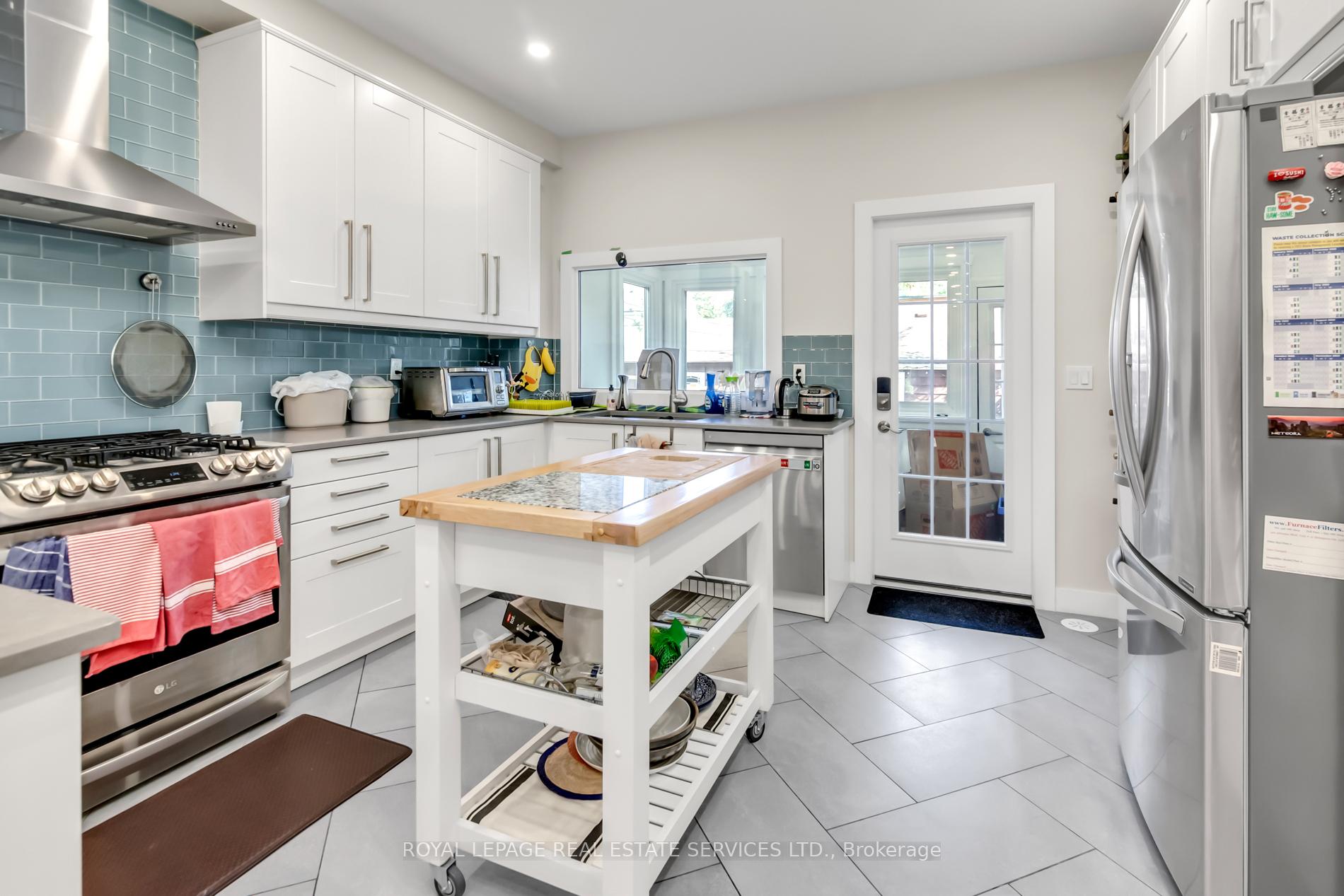 Photo 27 of 129 Langford Avenue, Toronto, Danforth — HOMEH
