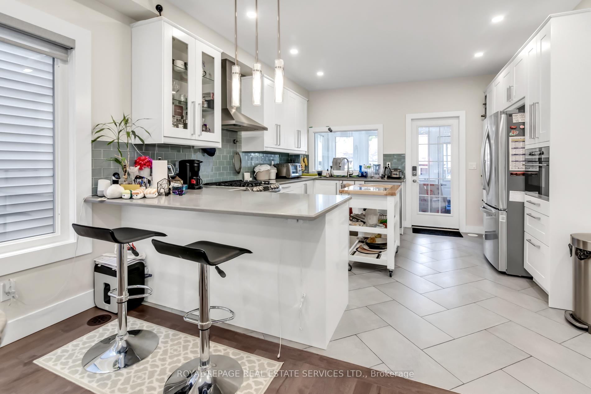 Photo 10 of 129 Langford Avenue, Toronto, Danforth — HOMEH
