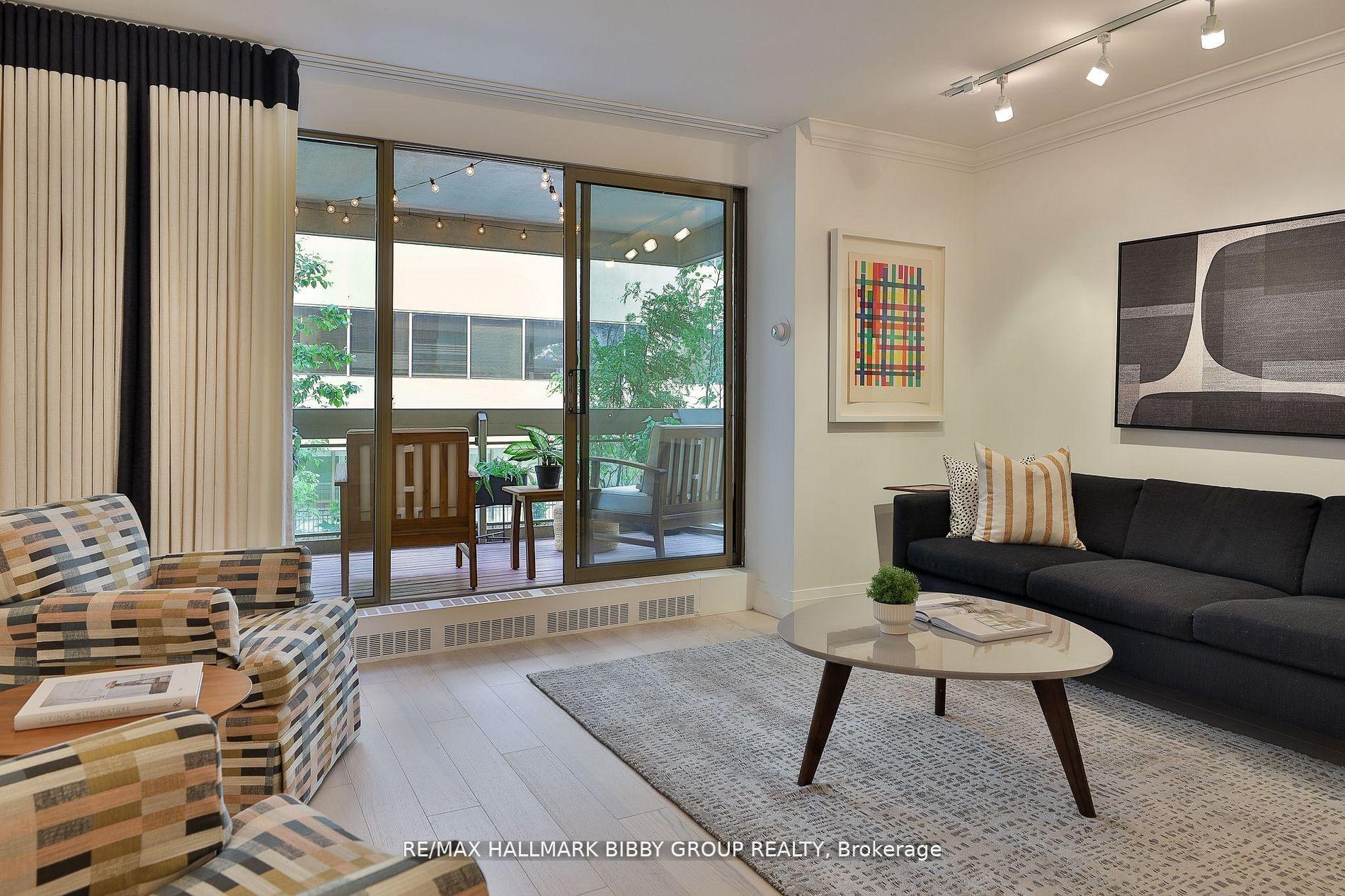 Photo 3 of Unit 206, 61 St Clair Avenue W, Toronto, Yonge-St. Clair — HOMEH