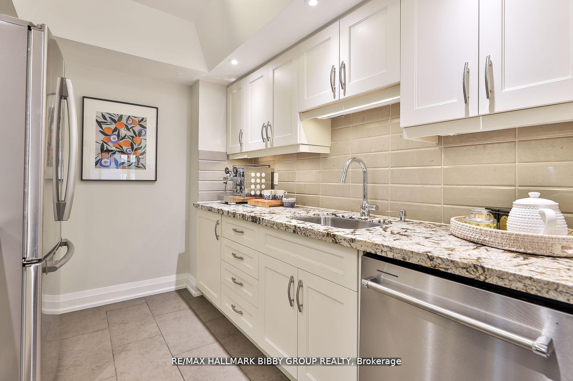 Photo 6 of Unit 206, 61 St Clair Avenue W, Toronto, Yonge-St. Clair — HOMEH