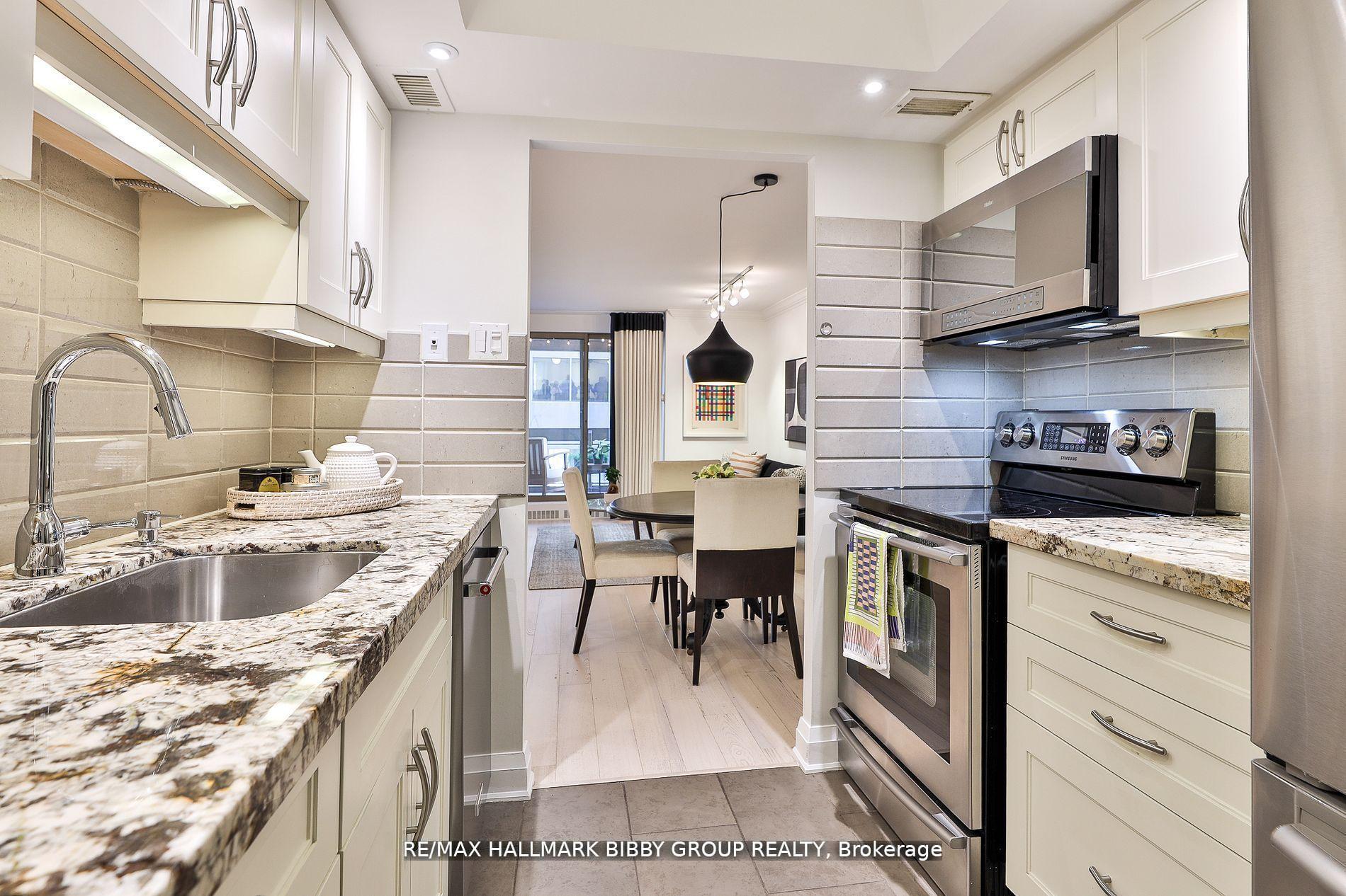 Photo 10 of Unit 206, 61 St Clair Avenue W, Toronto, Yonge-St. Clair — HOMEH
