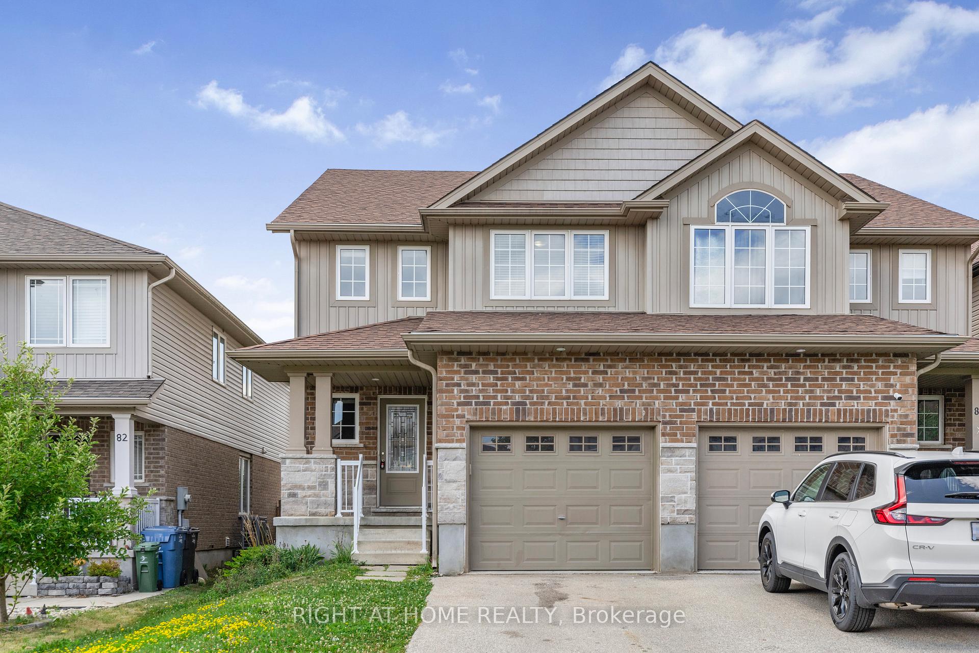 Photo 1 of 84 Couling Crescent, Guelph, Grange Road — HOMEH