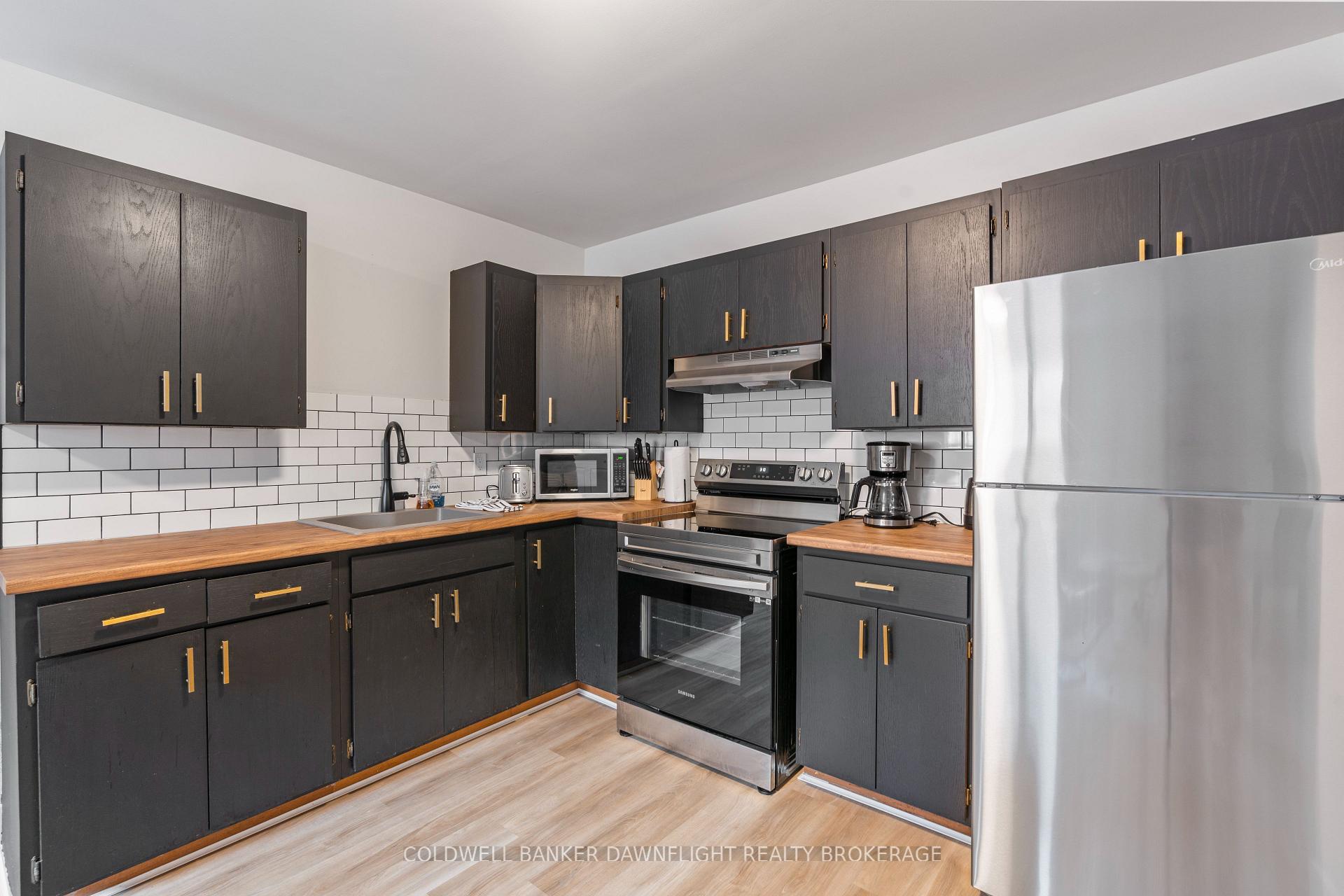 Photo 8 of Unit 3, 383 Main Street S, South Huron, Exeter — HOMEH