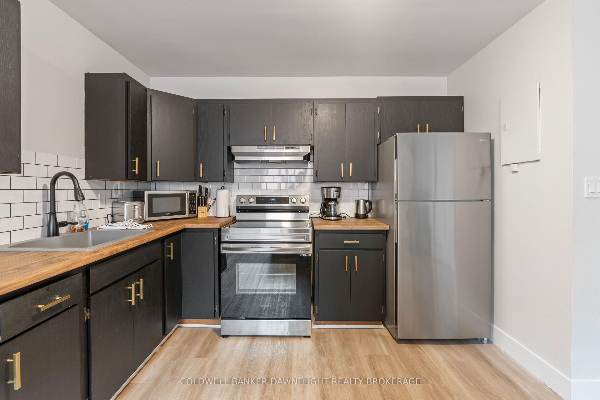 Photo 6 of Unit 3, 383 Main Street S, South Huron, Exeter — HOMEH