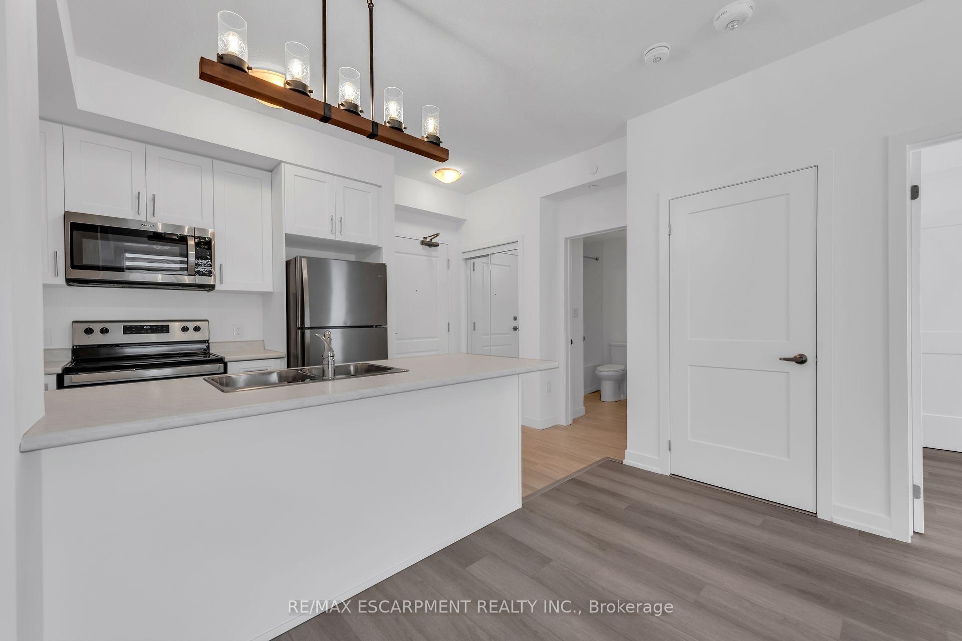 Photo 3 of Unit 331, 460 Dundas Street E, Hamilton, Waterdown — HOMEH