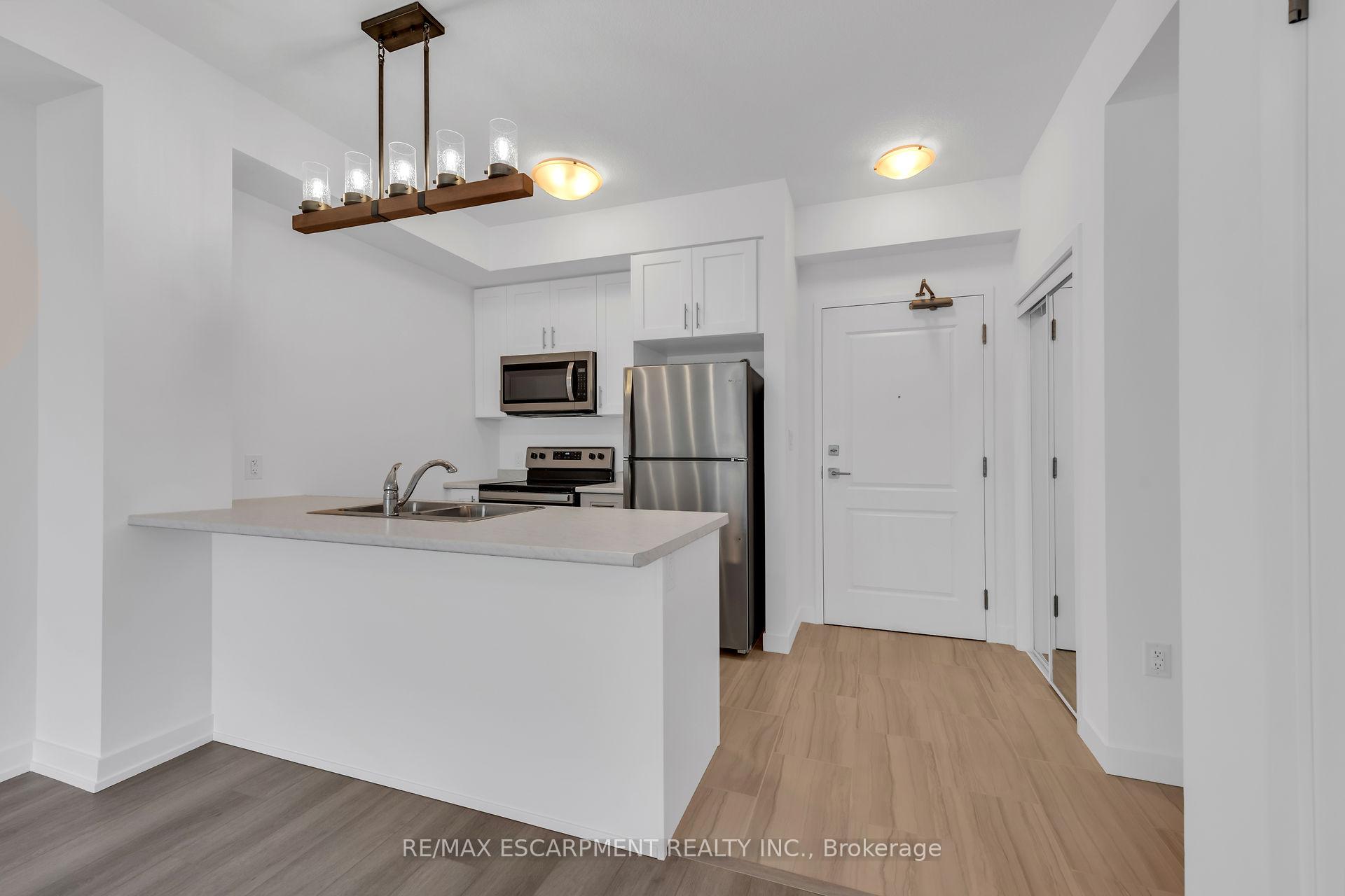 Photo 7 of Unit 331, 460 Dundas Street E, Hamilton, Waterdown — HOMEH