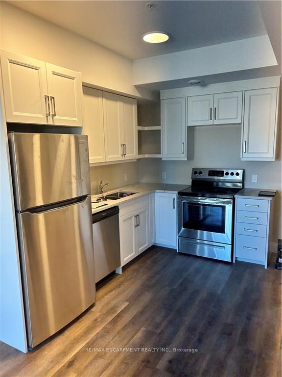 Photo 3 of Unit 208, 64 Main Street N, Haldimand — HOMEH