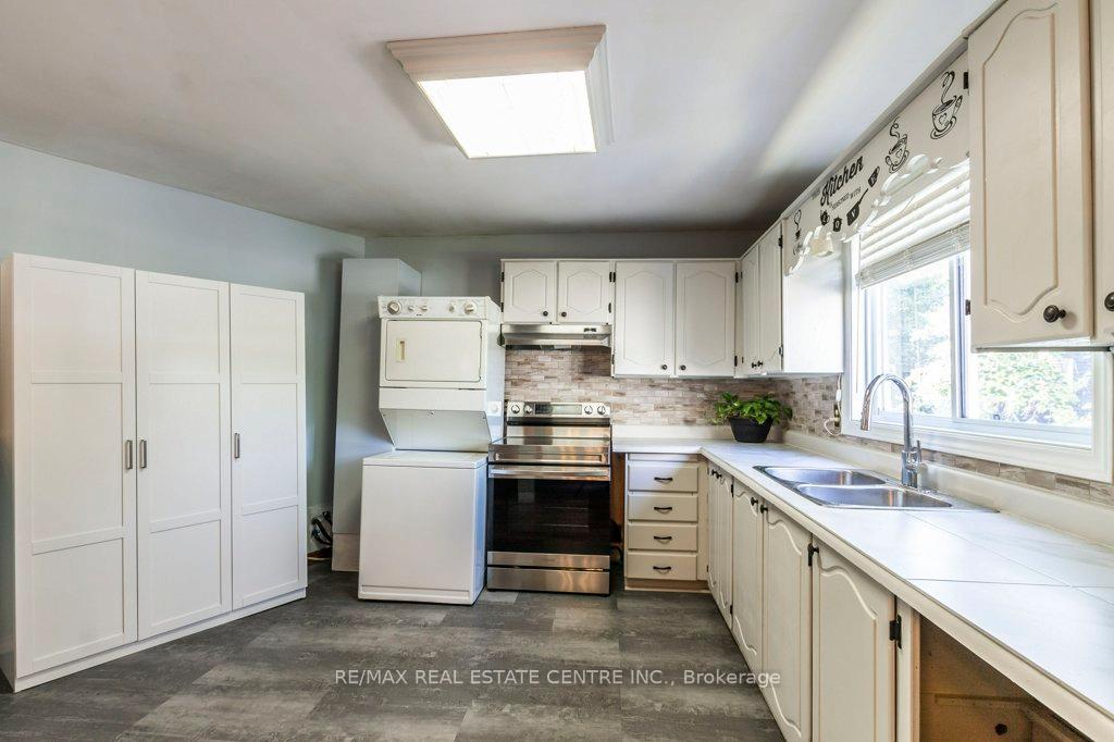 Photo 12 of Unit 63, 60 Elmsdale Drive, Kitchener — HOMEH