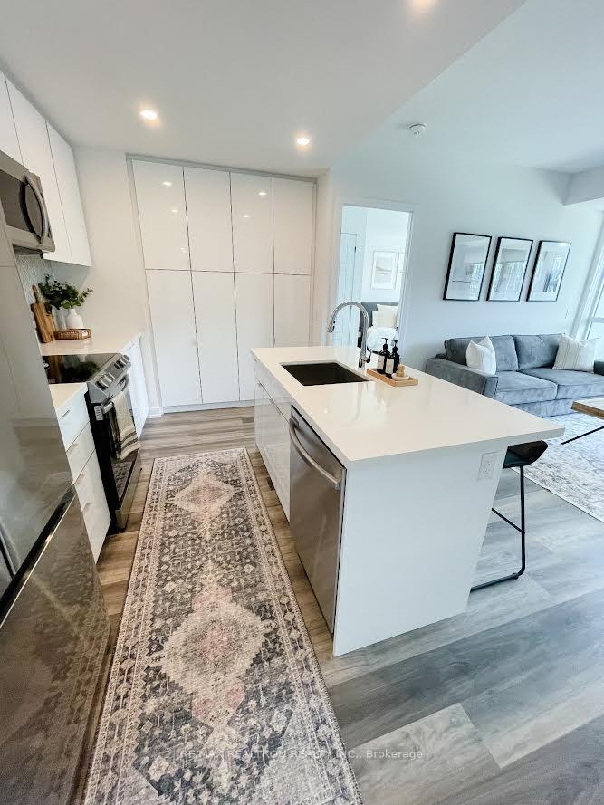 Photo 4 of Unit 320, 415 Sea Ray Avenue, Innisfil, Rural Innisfil — HOMEH