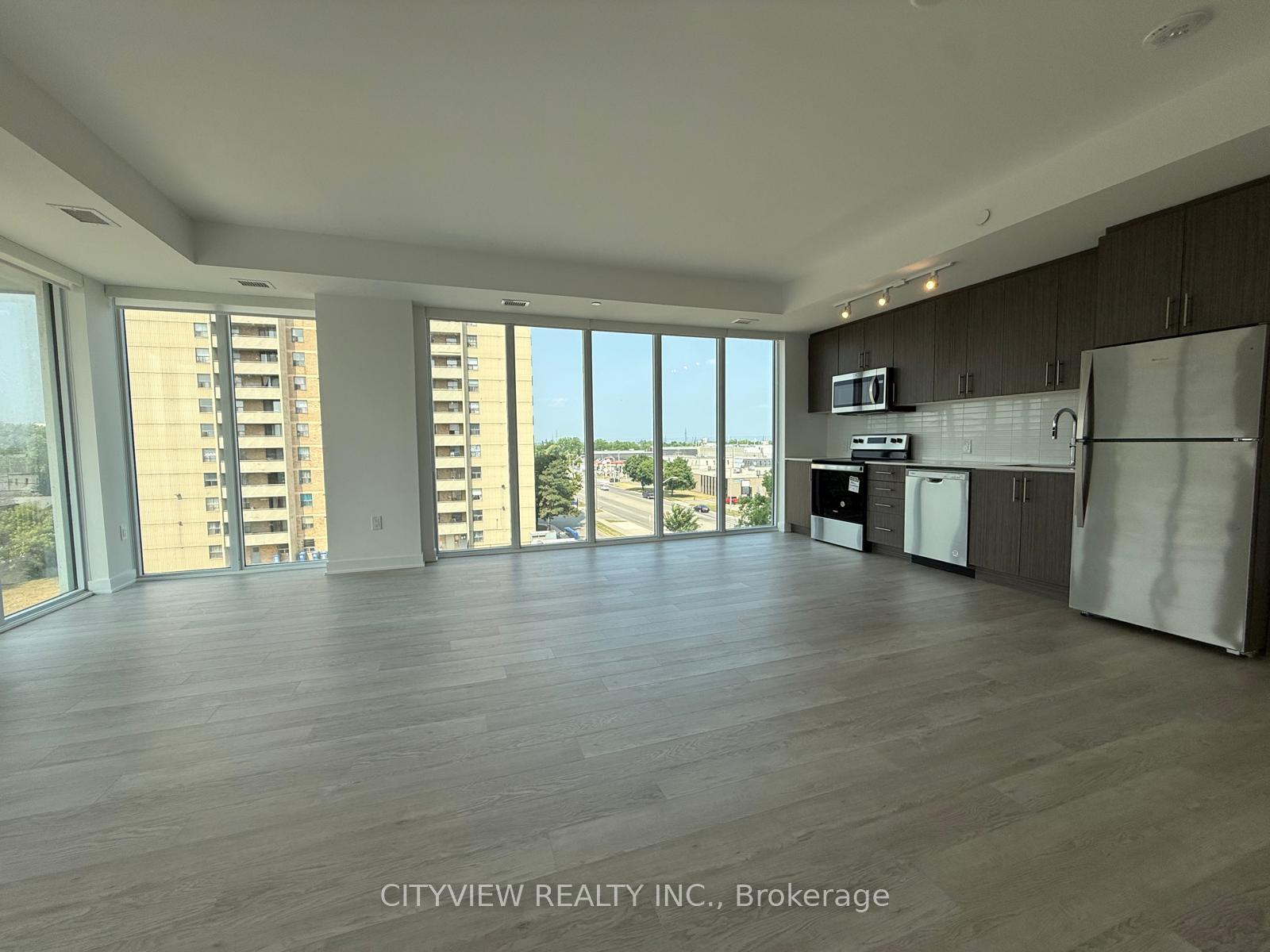 Photo 2 of Unit 406, 2782 Barton Street E, Hamilton, Riverdale — HOMEH