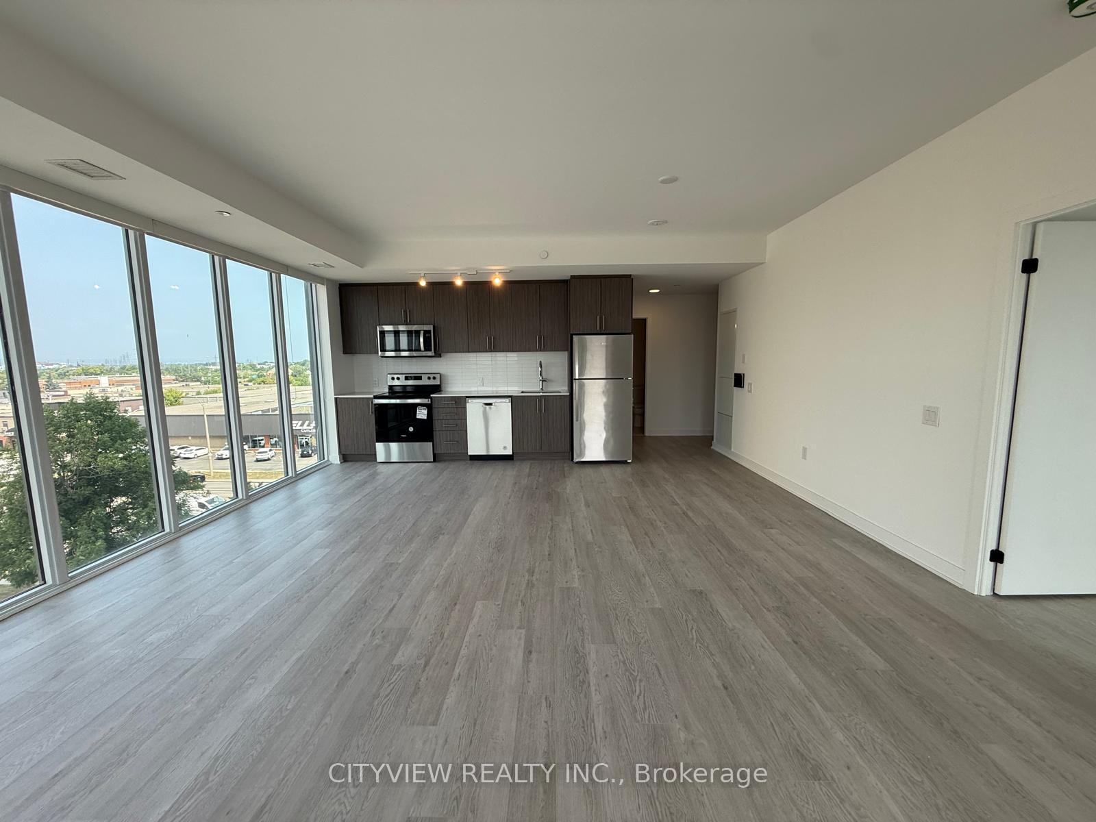 Photo 5 of Unit 406, 2782 Barton Street E, Hamilton, Riverdale — HOMEH