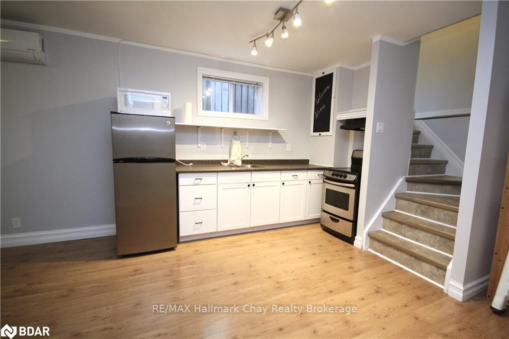 Photo 5 of Unit B, 65 Springdale Drive, Barrie, Cundles East — HOMEH