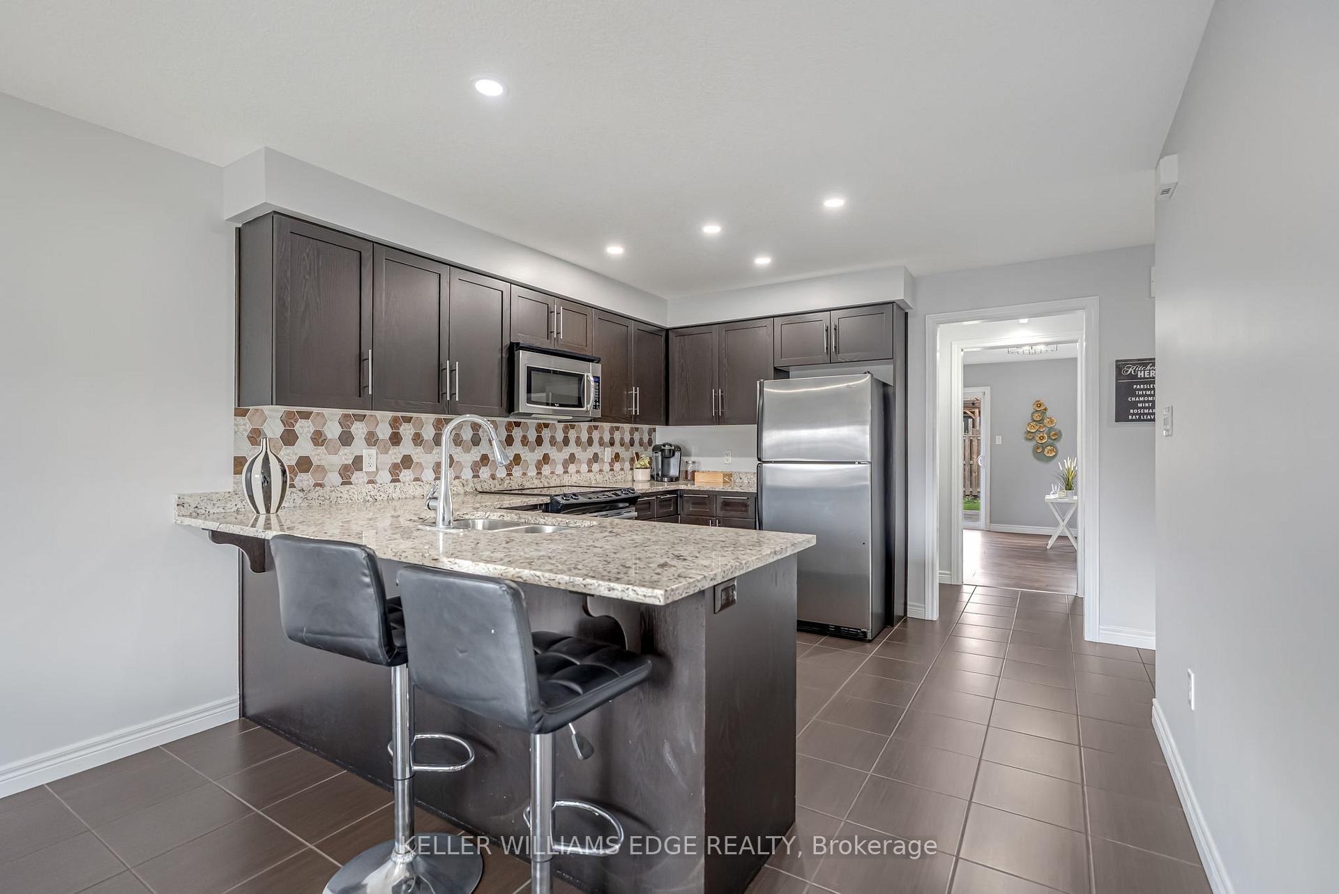 Photo 10 of 19 Oakes Crescent, Guelph, Grange Road — HOMEH