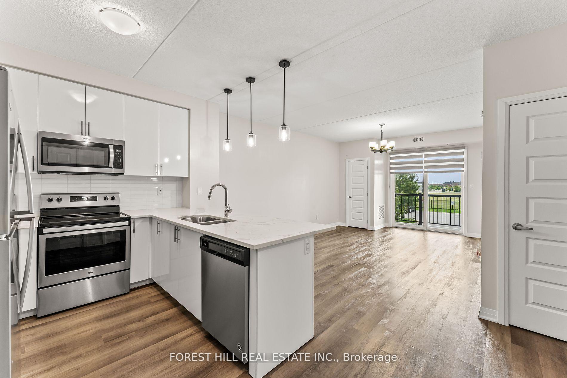 Photo 10 of Unit 201, 610 Farmstead Drive, Milton, Willmott — HOMEH