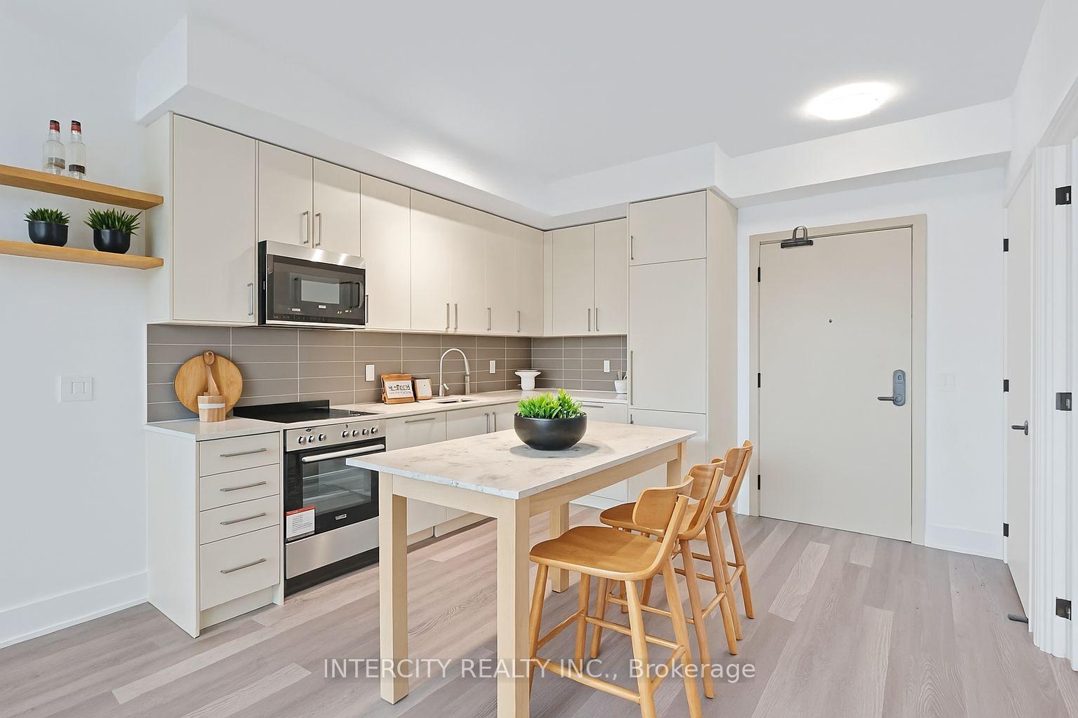 Photo 2 of Unit 322, 2075 King Road, King, King City — HOMEH