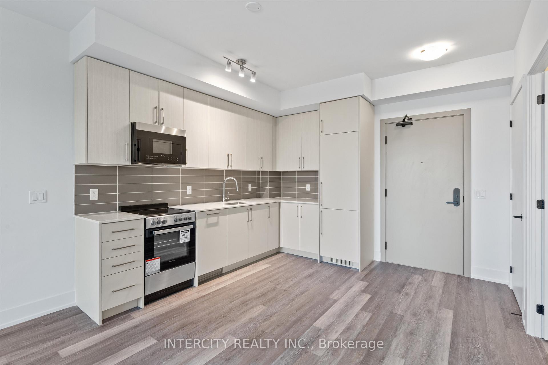 Photo 12 of Unit 322, 2075 King Road, King, King City — HOMEH
