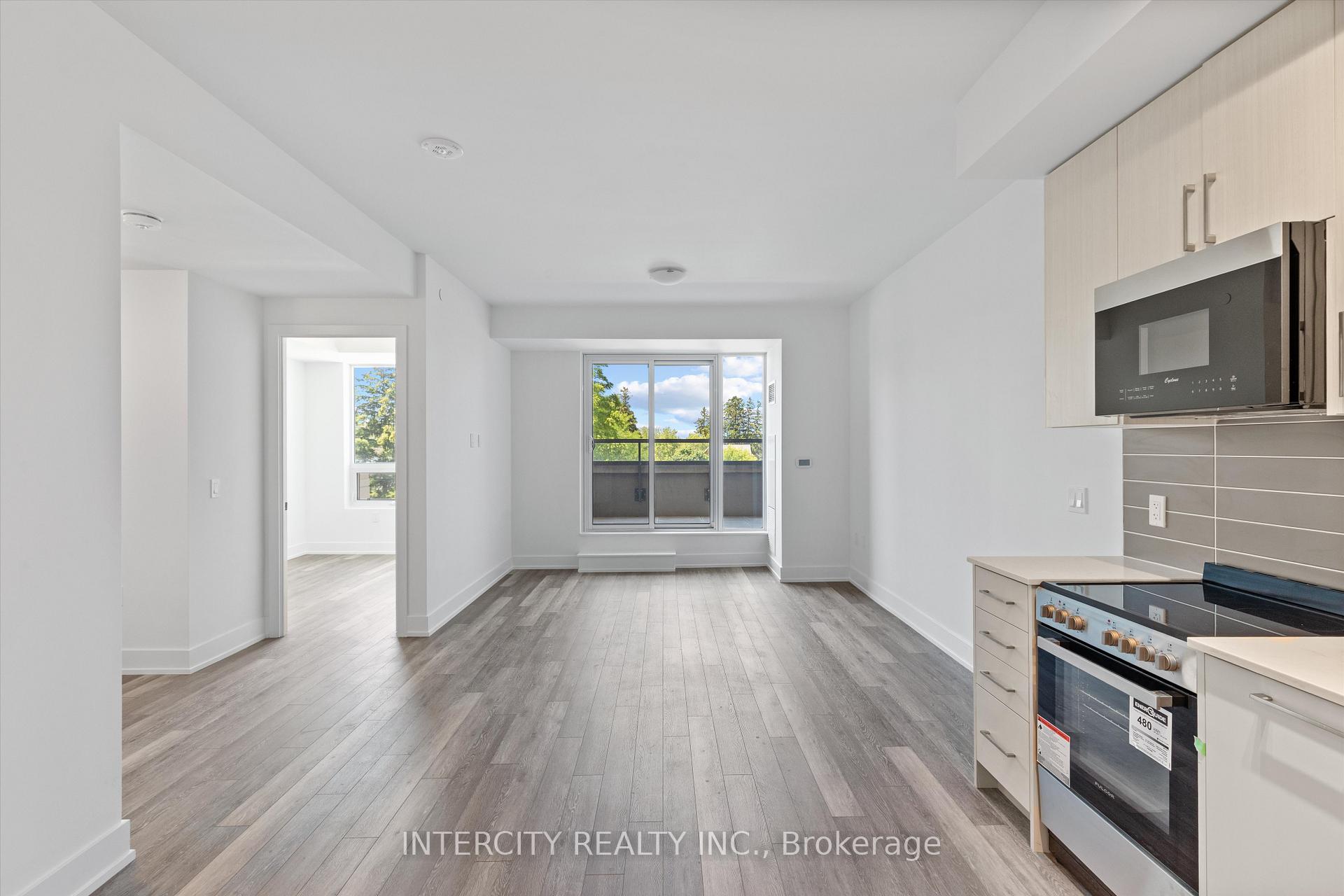 Photo 4 of Unit 322, 2075 King Road, King, King City — HOMEH