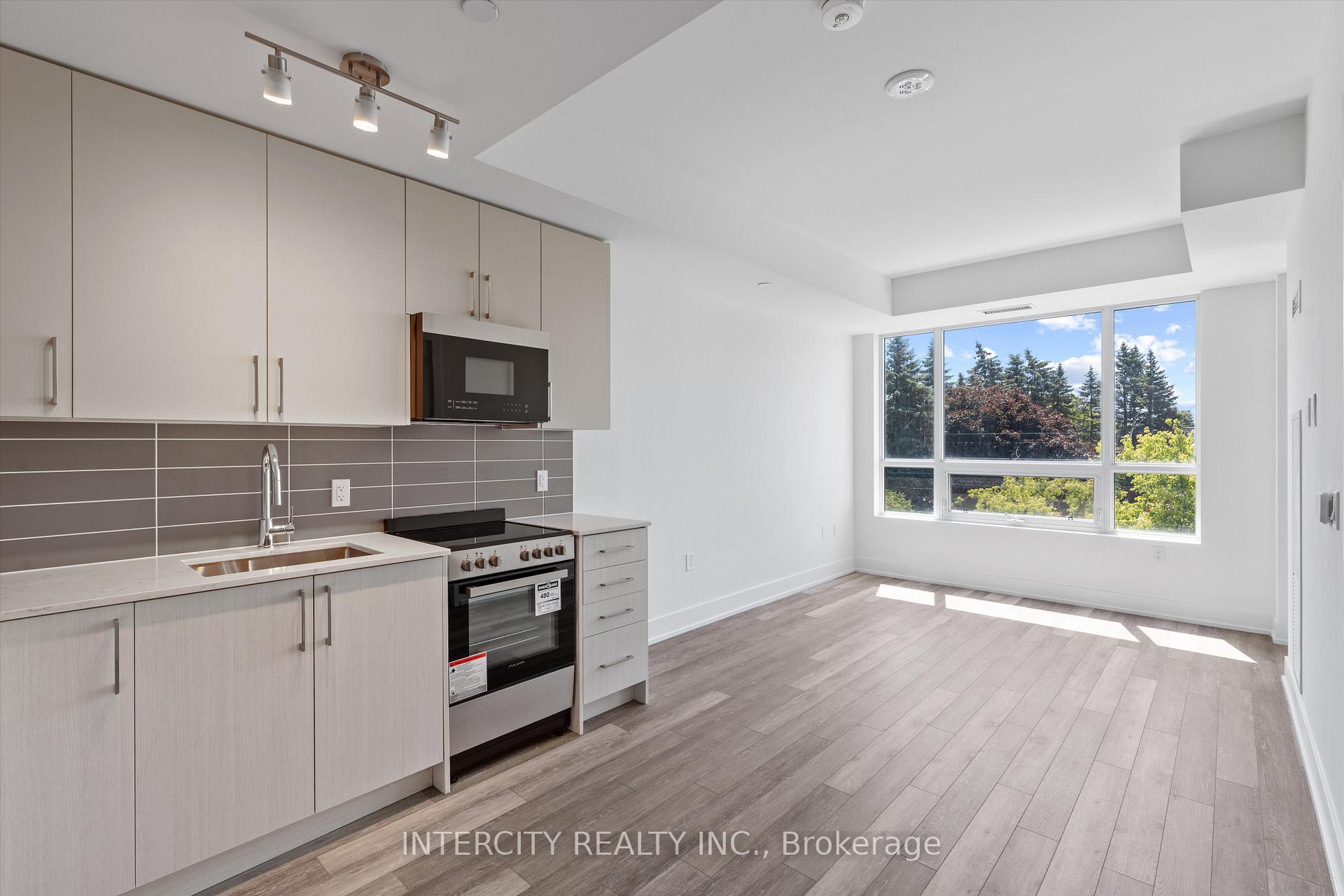 Photo 3 of Unit 317, 2075 King Road, King, King City — HOMEH