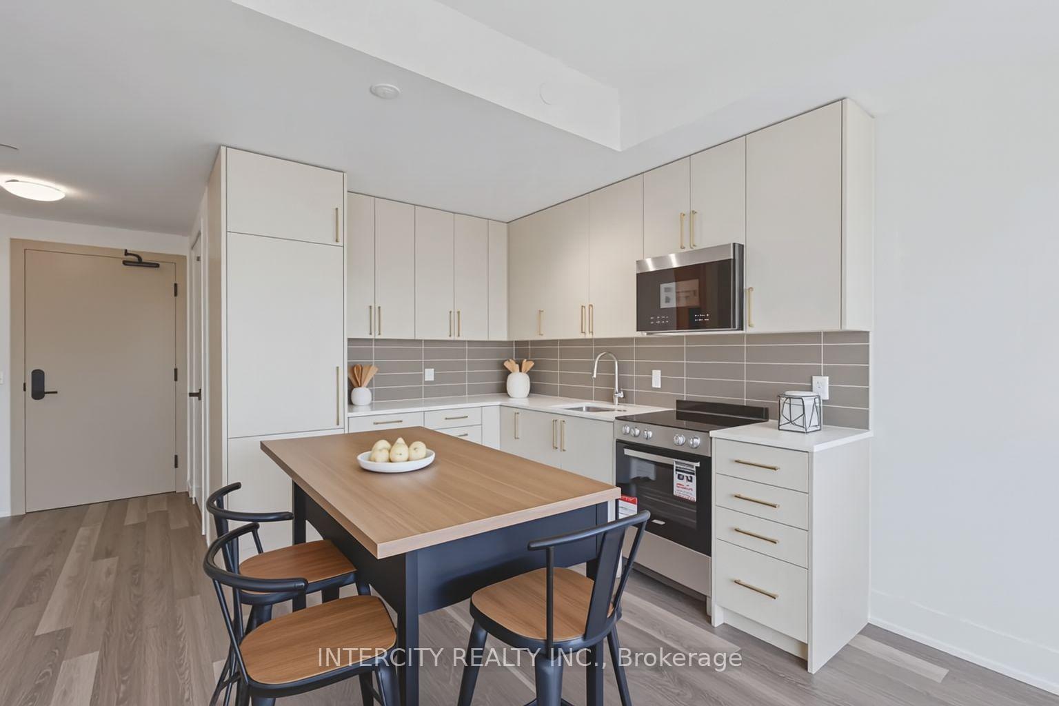 Photo 4 of Unit 317, 2075 King Road, King, King City — HOMEH