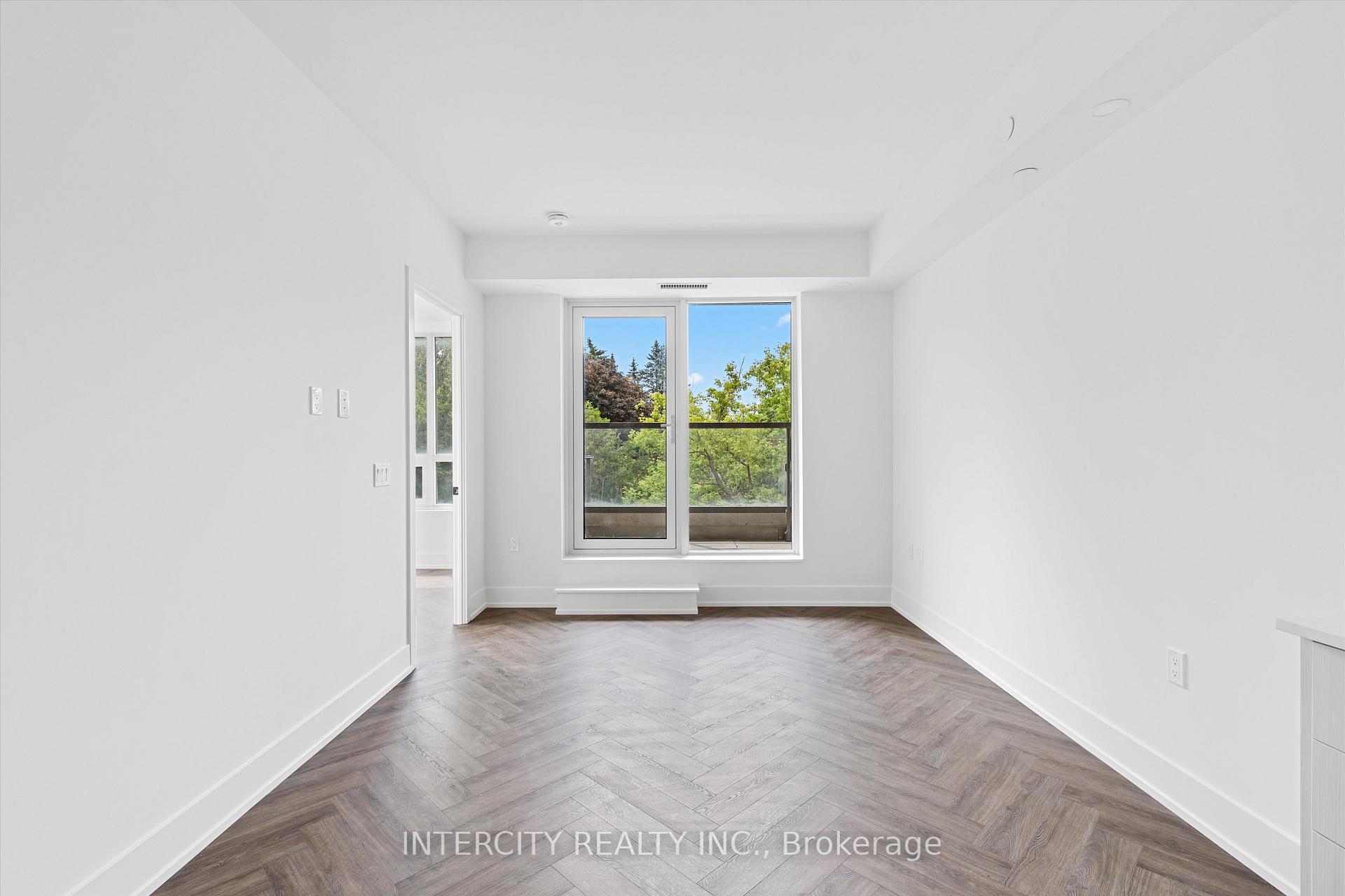 Photo 4 of Unit 216, 2075 King Road, King, King City — HOMEH