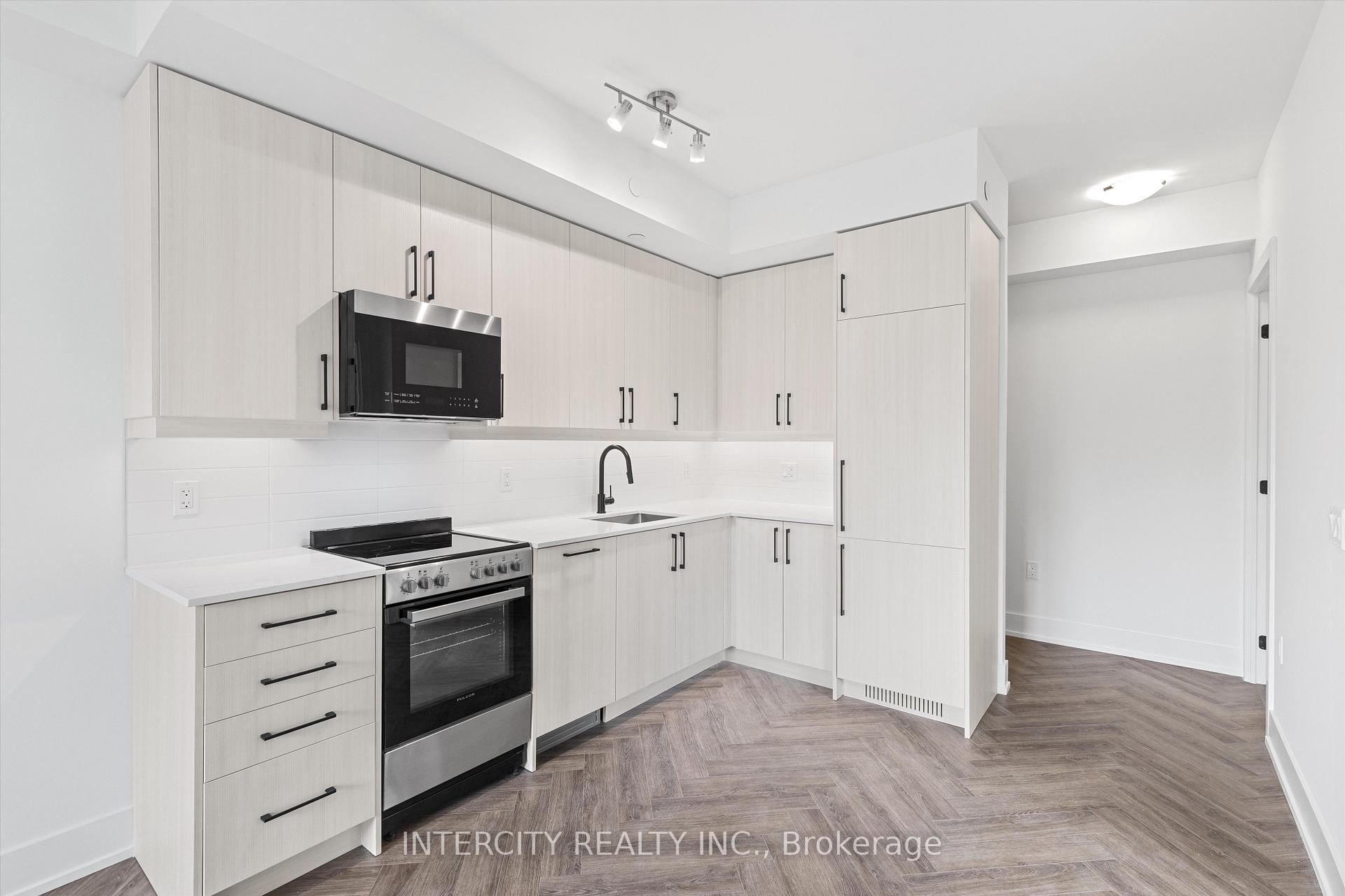 Photo 5 of Unit 216, 2075 King Road, King, King City — HOMEH