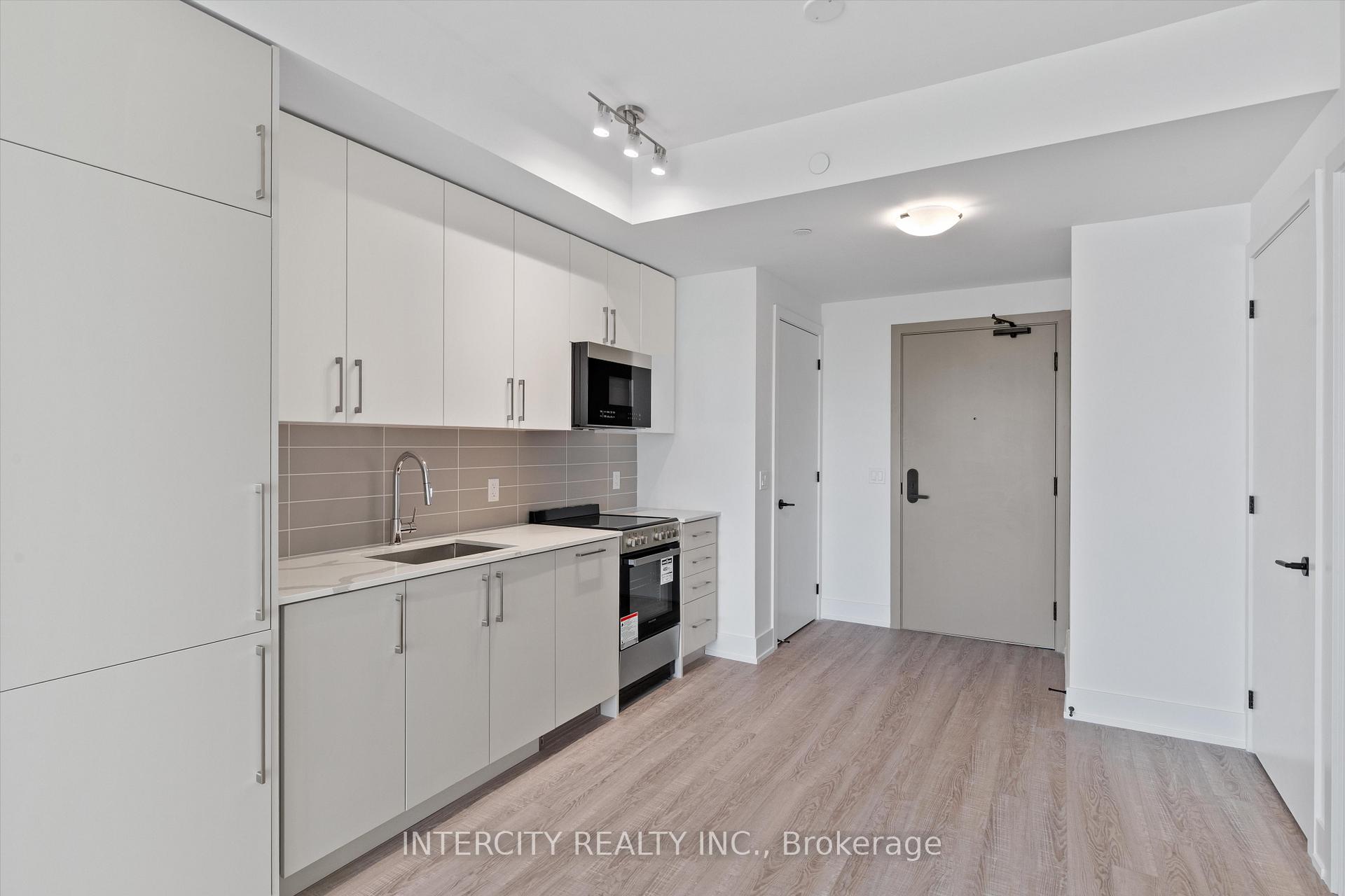 Photo 4 of Unit 241, 2075 King Road, King, King City — HOMEH
