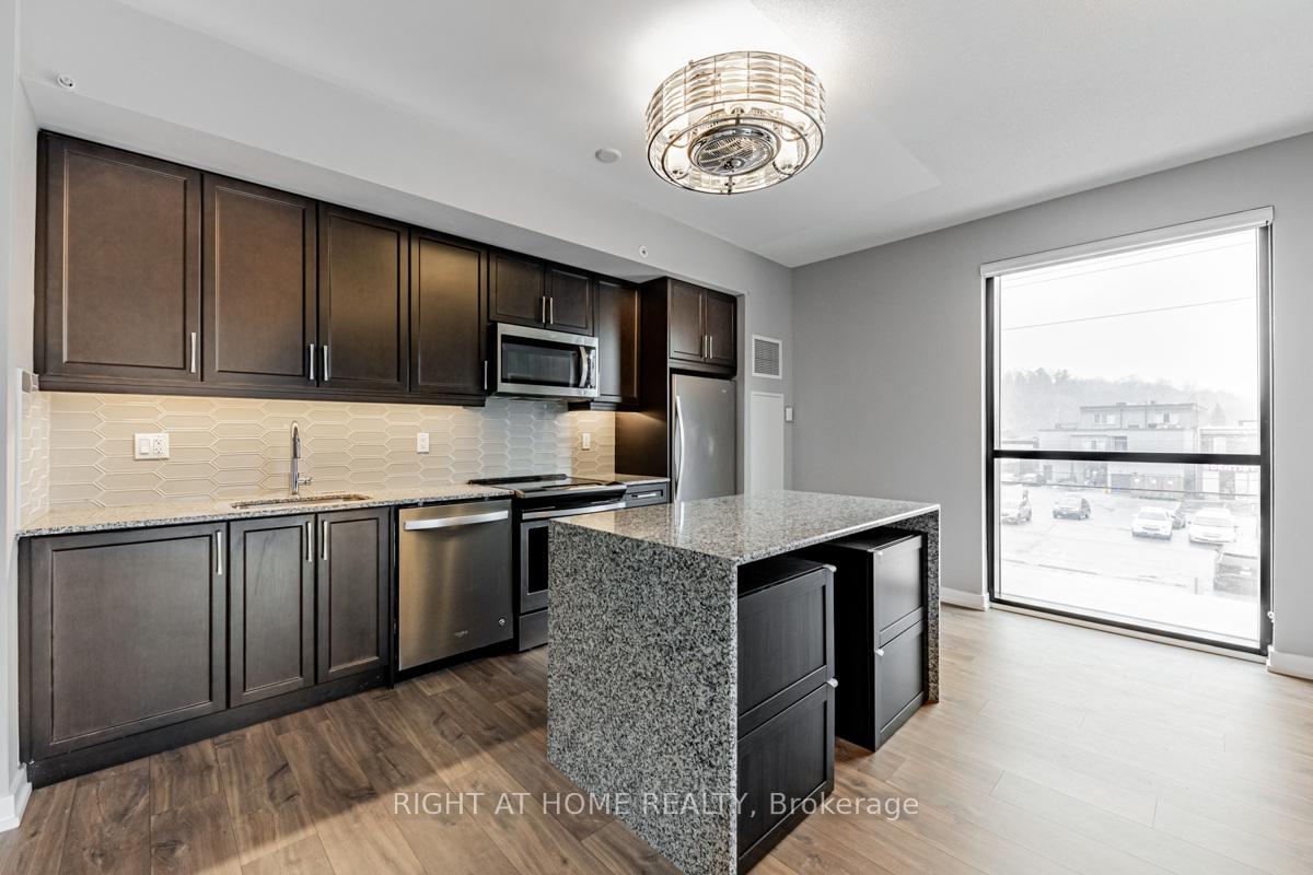 Photo 2 of Unit 215, 50 Ann Street, Caledon, Bolton West — HOMEH