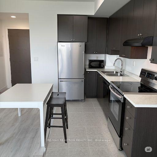 Photo 3 of Unit 1513, 1346 Danforth Road, Scarborough, Eglinton East — HOMEH