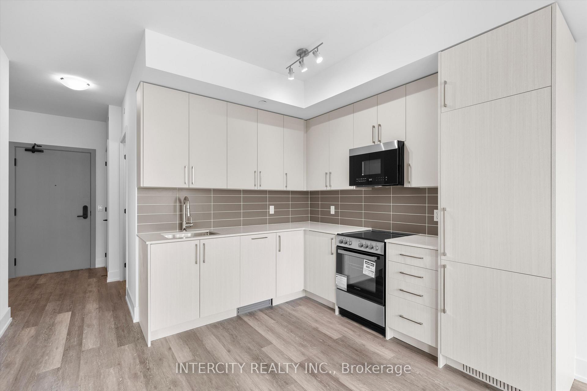 Photo 3 of Unit 213, 2075 King Road, King, King City — HOMEH