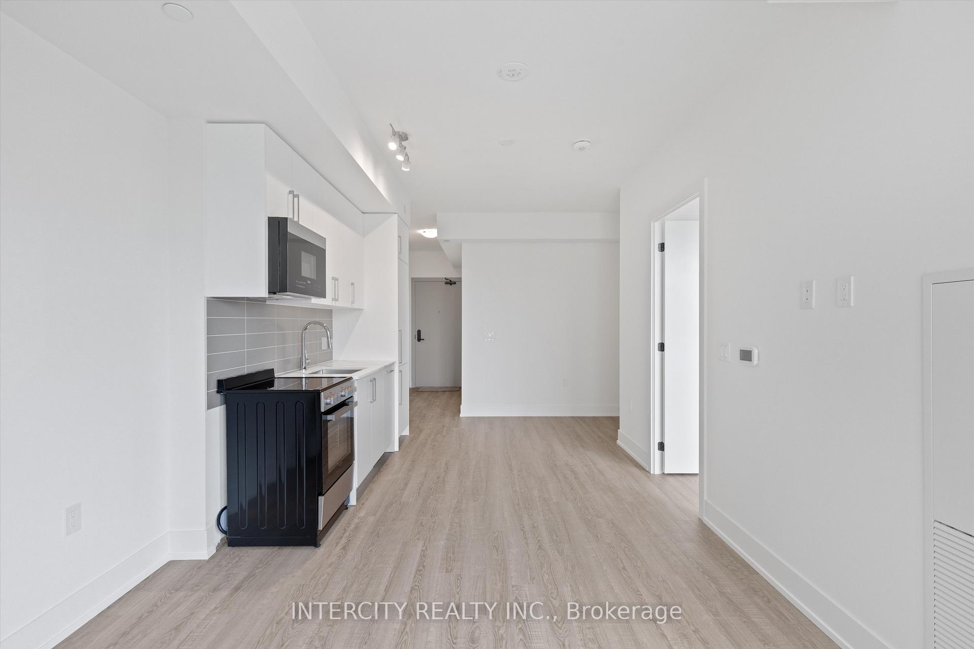 Photo 2 of Unit 411, 2075 King Road, King, King City — HOMEH