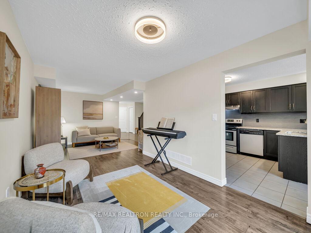 Photo 10 of 76 Couling Crescent, Guelph, Grange Road — HOMEH