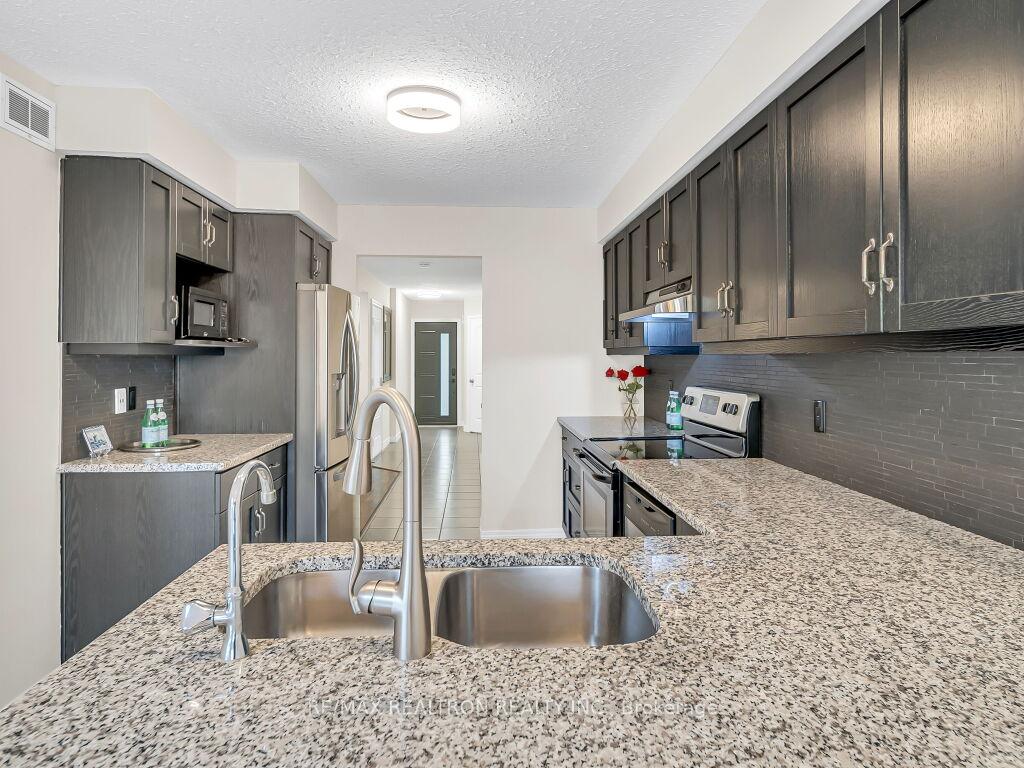 Photo 14 of 76 Couling Crescent, Guelph, Grange Road — HOMEH