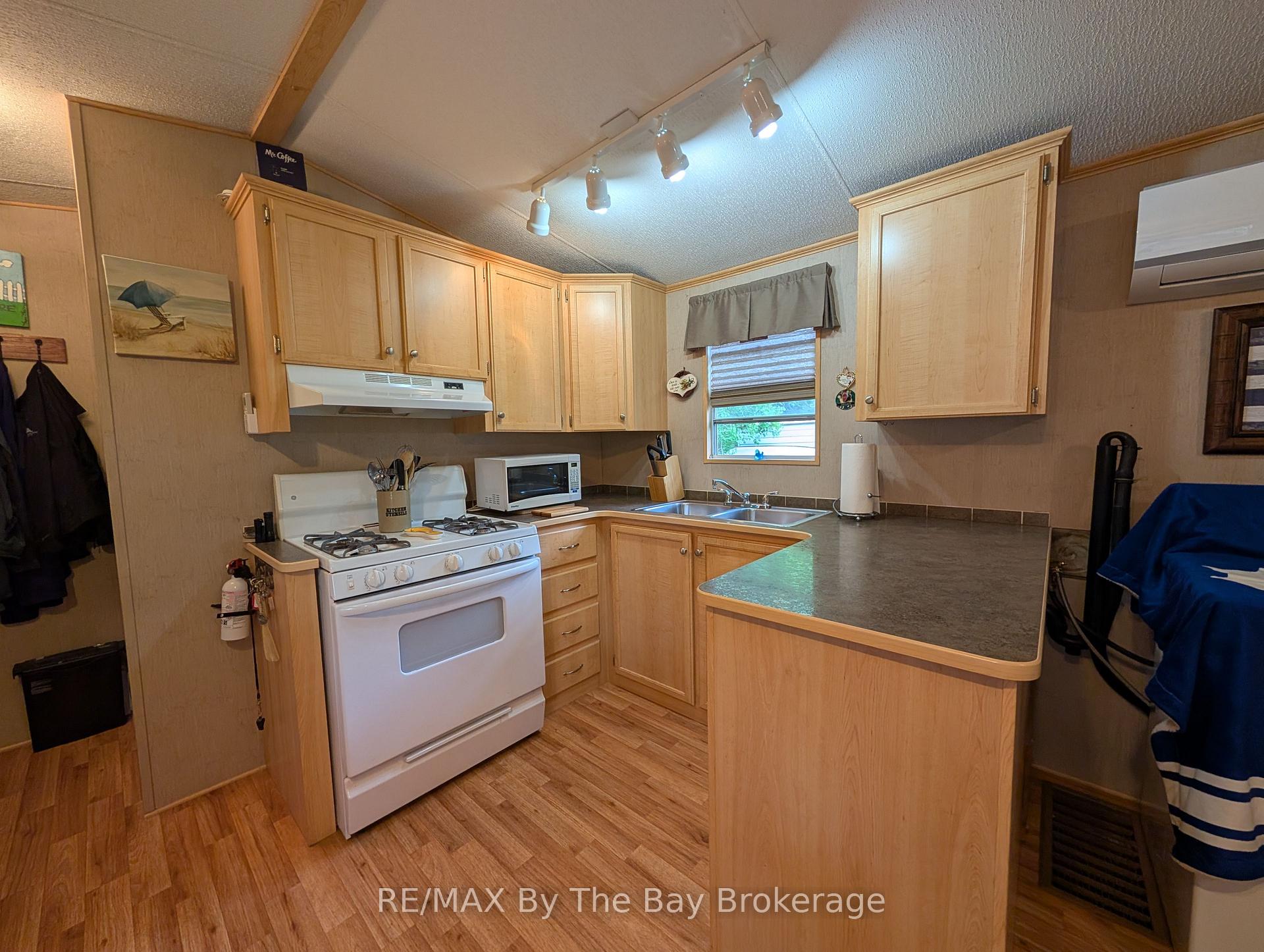 Photo 4 of Unit 179, 85 Theme Park Drive, Wasaga Beach — HOMEH