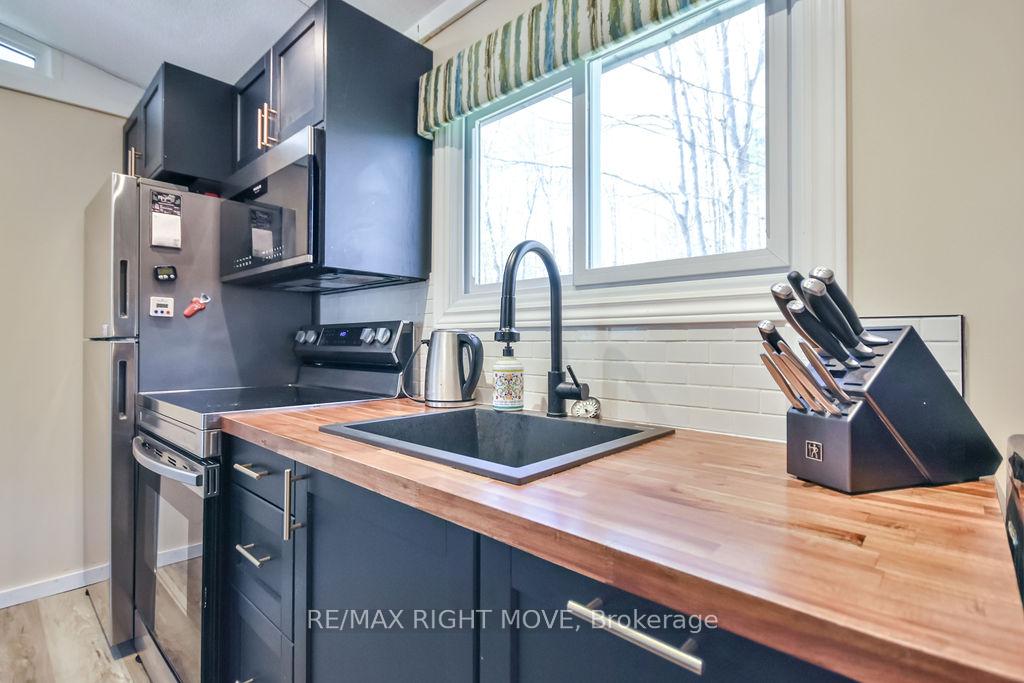 Photo 8 of 7697 West River Road, Ramara, Rural Ramara — HOMEH