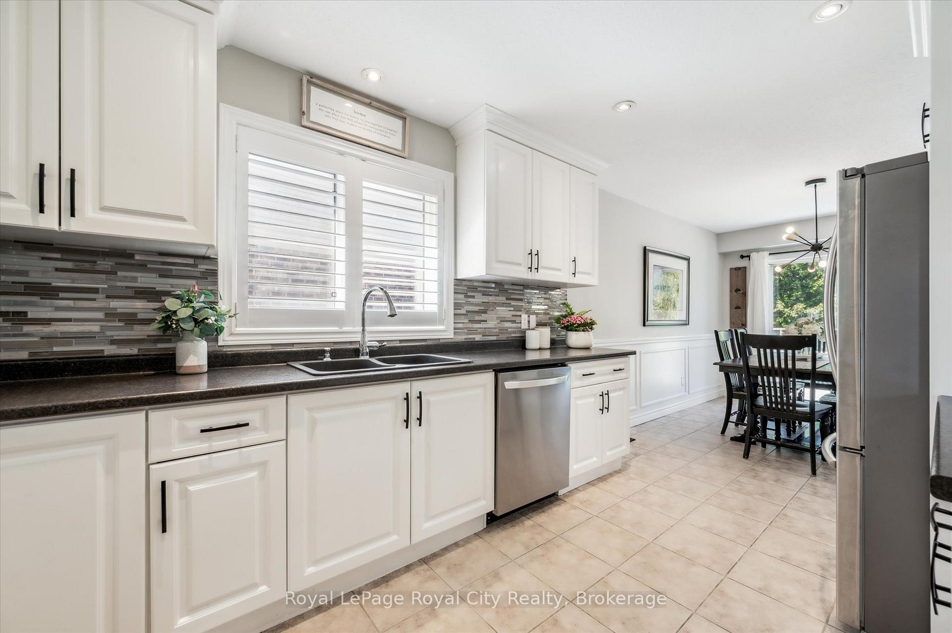 Photo 7 of 38 Marshall Drive, Guelph, Grange Road — HOMEH