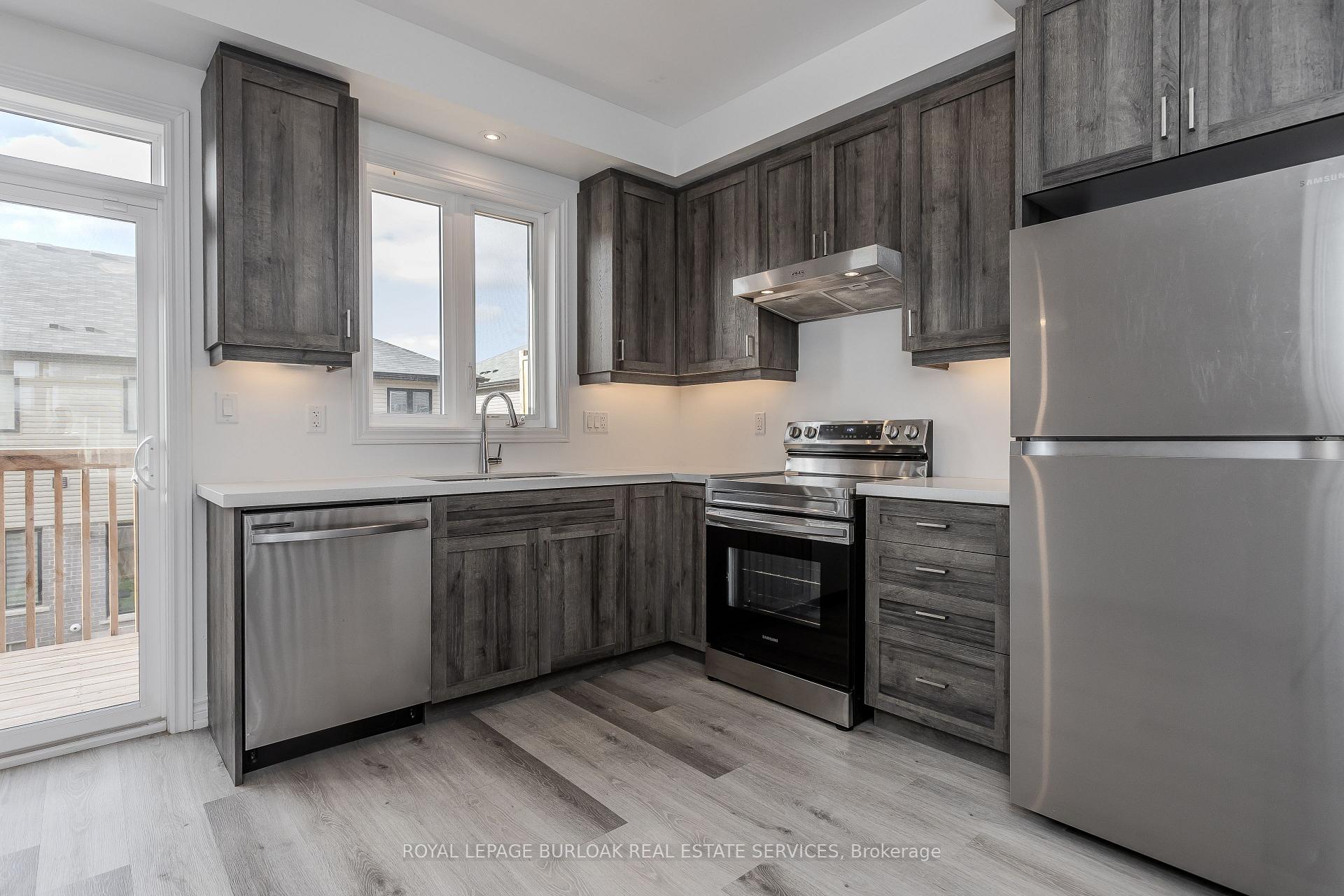 Photo 12 of Unit 56, 461 Blackburn Drive, Brantford — HOMEH