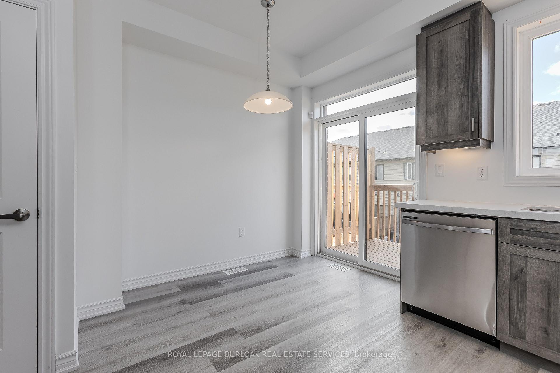 Photo 11 of Unit 56, 461 Blackburn Drive, Brantford — HOMEH