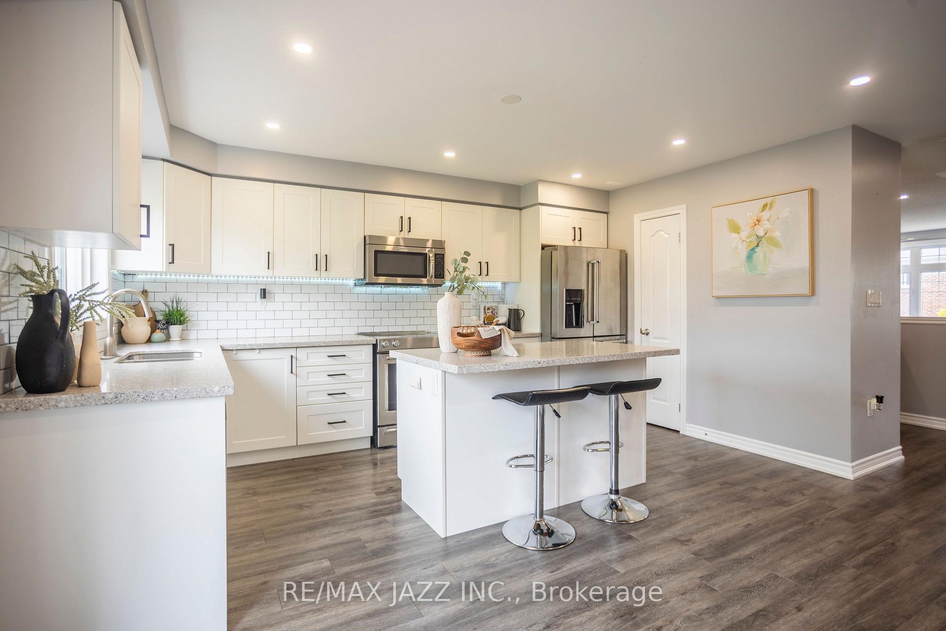 Photo 9 of 61 Markham Trail, Clarington, Bowmanville — HOMEH