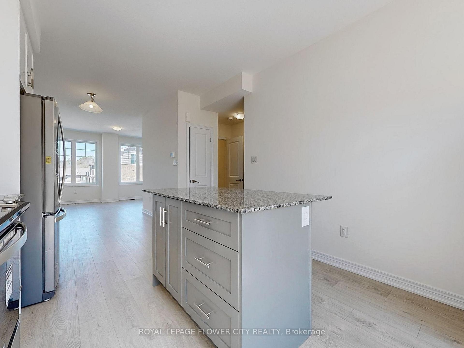Photo 5 of Unit 106, 10 Birmingham Drive N, Cambridge — HOMEH