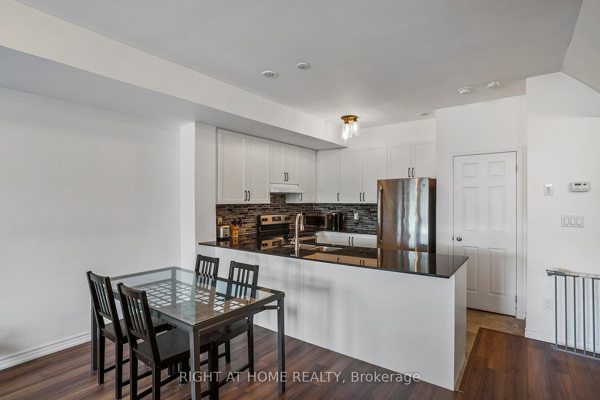 Photo 4 of Unit 2, 1020 Dunsley Way N, Whitby, Pringle Creek — HOMEH