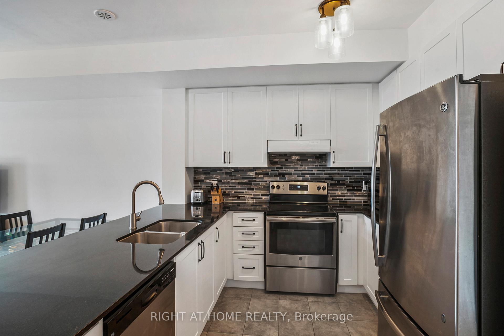 Photo 6 of Unit 2, 1020 Dunsley Way N, Whitby, Pringle Creek — HOMEH
