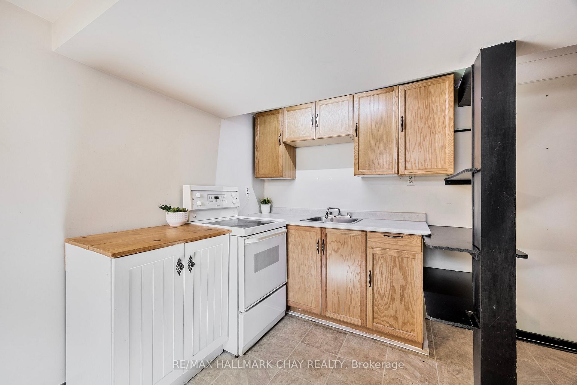 Photo 17 of 89 Sanford Street, Barrie, Lakeshore — HOMEH
