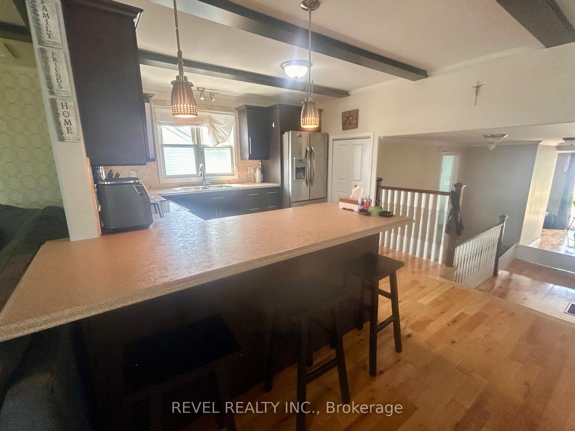 Photo 41 of 361 Eleventh Avenue, Cochrane — HOMEH