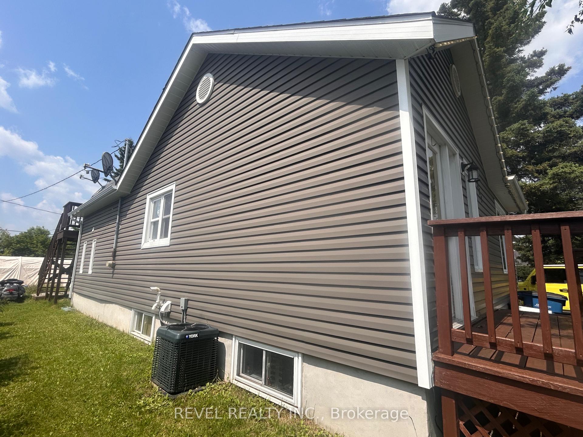 Photo 22 of 361 Eleventh Avenue, Cochrane — HOMEH