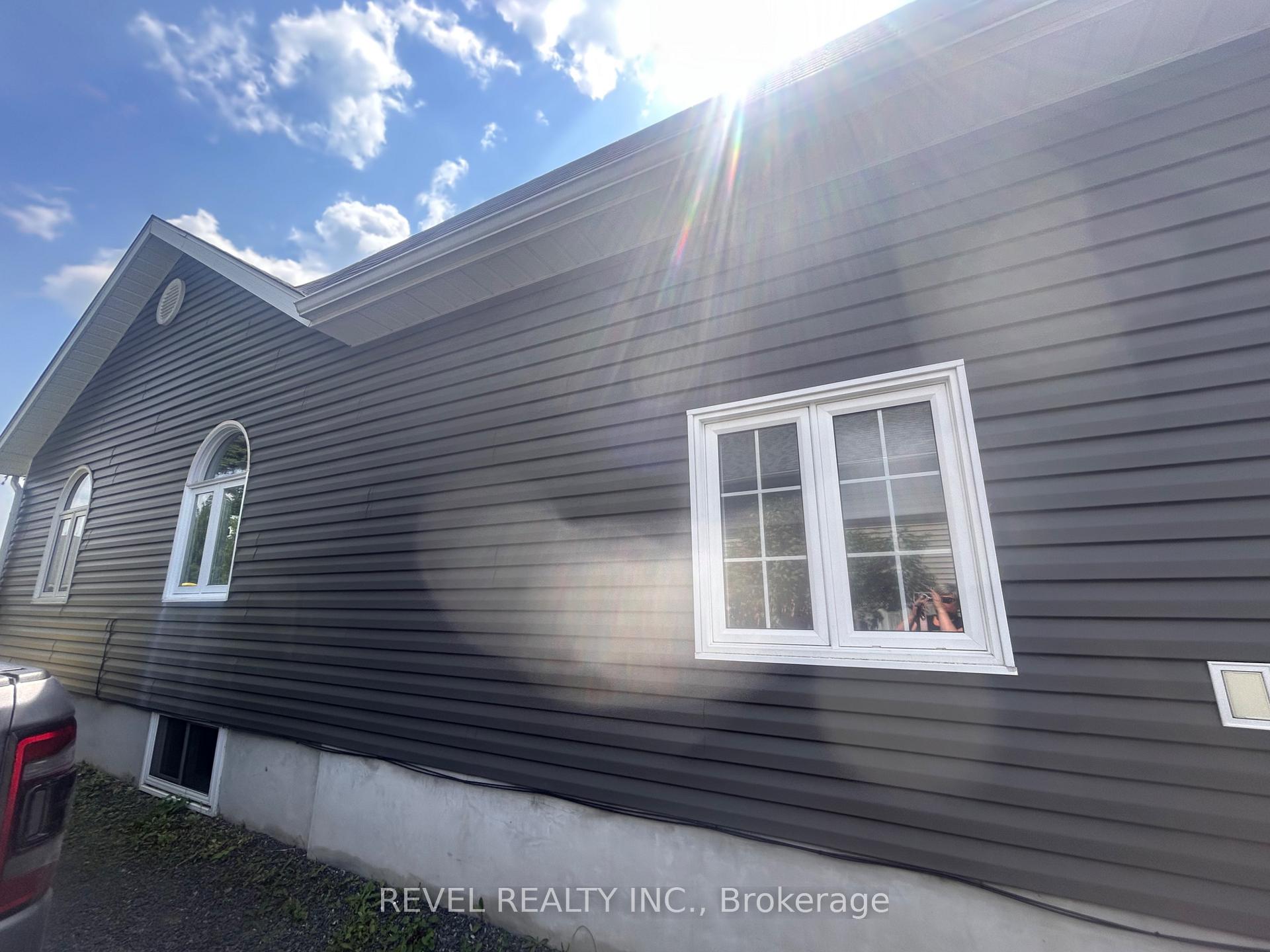 Photo 19 of 361 Eleventh Avenue, Cochrane — HOMEH