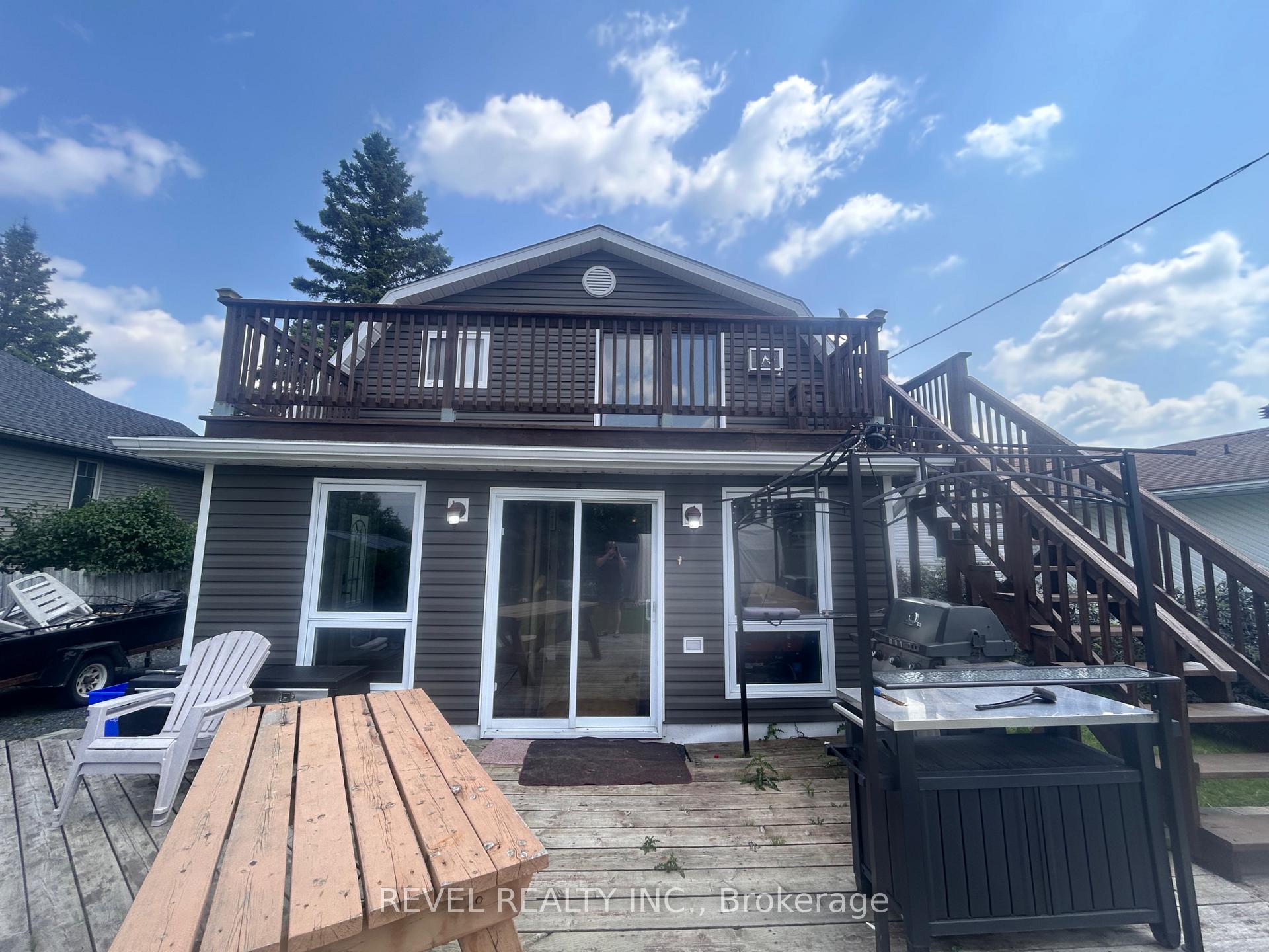 Photo 40 of 361 Eleventh Avenue, Cochrane — HOMEH
